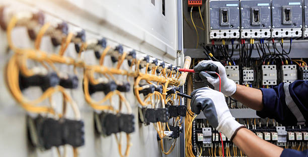 Professional Electrician technician working in Bowie, TX